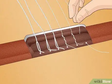 Image titled Change Classical Guitar Strings Step 11