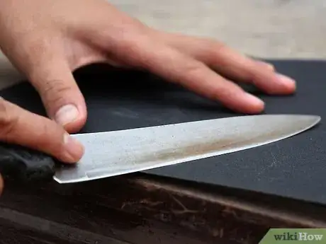 Image titled Sharpen Kitchen Knives with Sandpaper Step 3