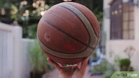 Image titled Spin a Basketball on Your Finger Step 7