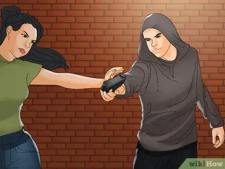 Image titled Disarm a Criminal with a Handgun Step 7