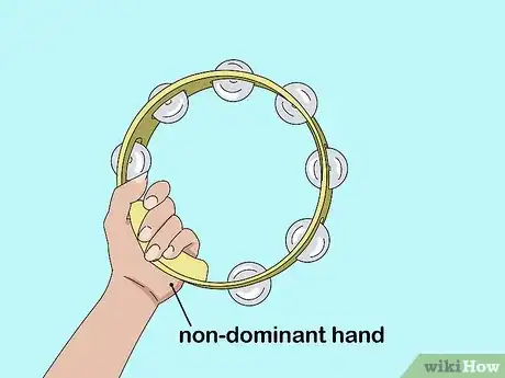 Image titled Play a Tambourine Step 1