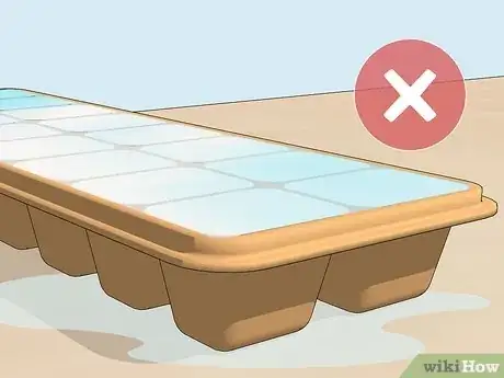 Image titled Remove Ice Cubes From a Tray Step 5