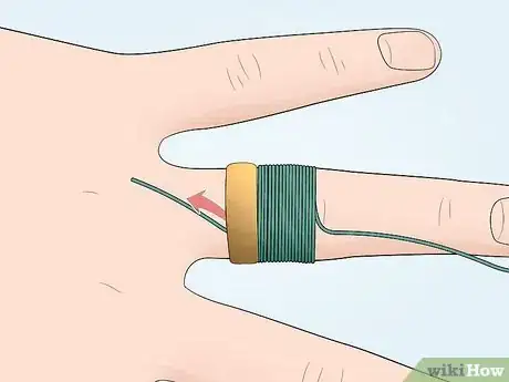 Image titled Remove a Ring with a String Step 4