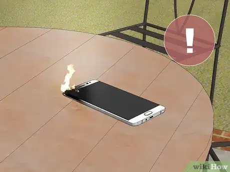 Image titled Put Out a Cell Phone Fire Step 1