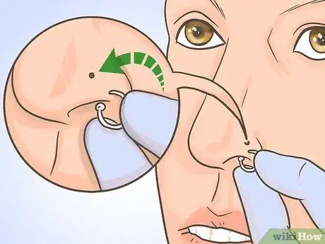 Image titled Change a Nose Piercing Step 10