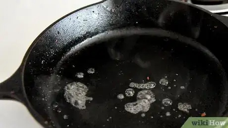 Image titled Clean Your Cast Iron Skillet or Pot After Daily Use Step 3