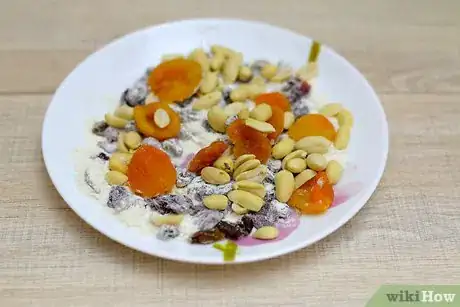 Image titled Stop Dried Fruit and Nuts from Falling to the Bottom of Cakes Step 5