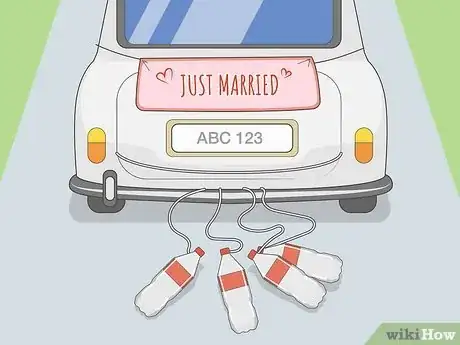 Image titled Decorate a Wedding Car with Ribbon Step 12