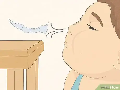 Image titled Teach Your Child to Blow Their Nose Step 2