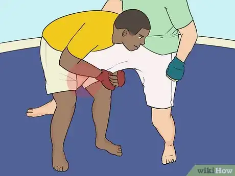 Image titled Do a Single Leg Takedown Step 3.jpeg