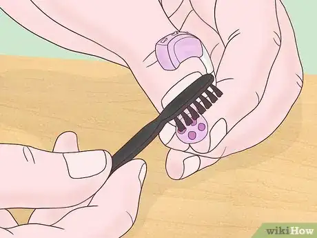 Image titled Remove Ear Wax from a Hearing Aid Step 1