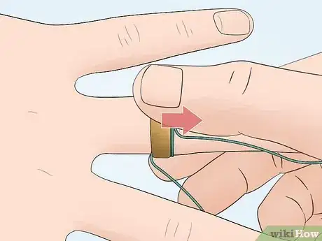 Image titled Remove a Ring with a String Step 6