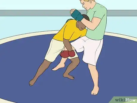 Image titled Do a Single Leg Takedown Step 2.jpeg