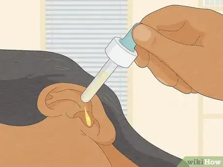 Image titled Remove Water from Ears Step 8