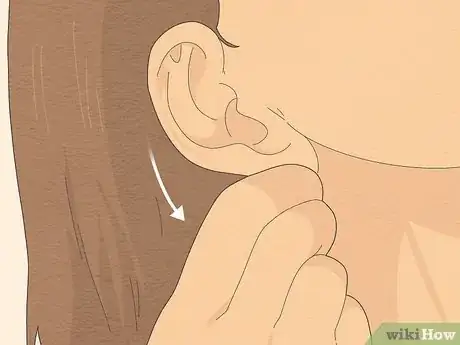 Image titled Remove Water from Ears Step 2