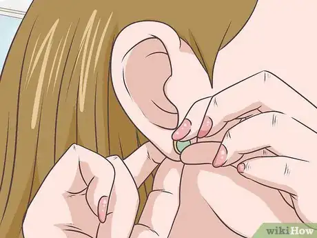 Image titled Remove Earrings Step 1