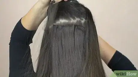 Image titled Remove Tape Hair Extensions Step 1