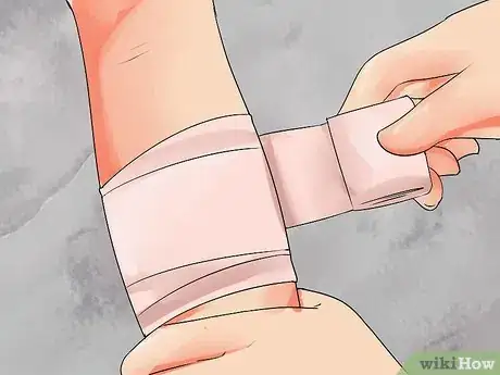 Image titled Bandage a Wound During First Aid Step 11