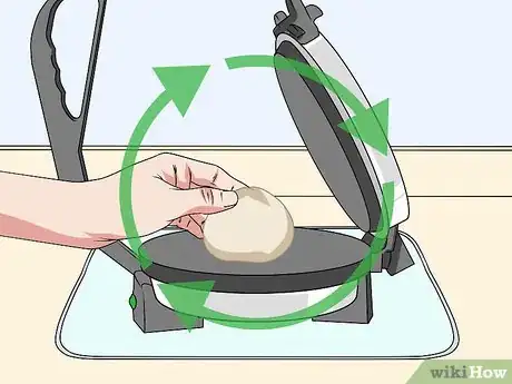 Image titled Make Roti with Electronic Roti Maker Step 16