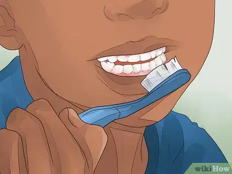 Image titled Make a Loose Tooth Fall Out Without Pulling It Step 1