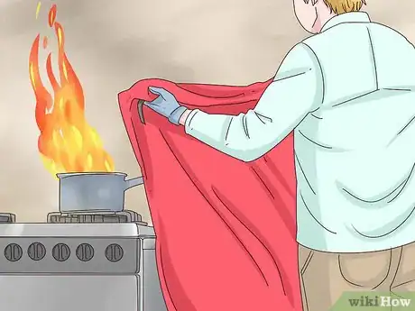 Image titled Use a Fire Blanket Step 3