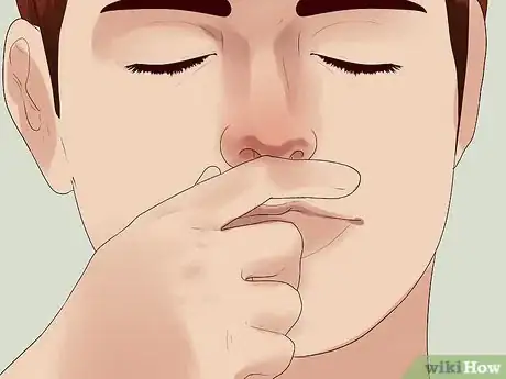 Image titled Wipe Your Nose on Your Hands Step 1
