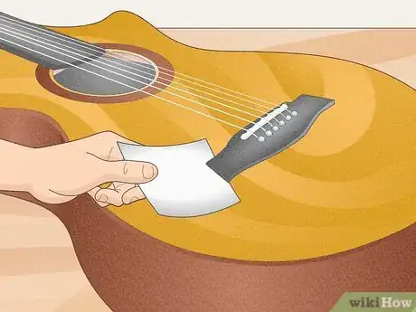 Image titled Fix a Guitar Bridge Step 1
