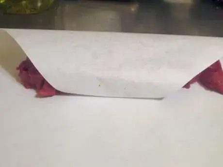 Image titled Fold tail over and flip meat