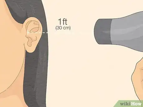 Image titled Remove Water from Ears Step 7