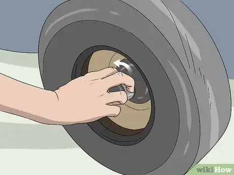 Image titled Remove a Lawn Mower Wheel Step 9