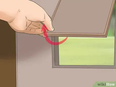 Image titled Train Your Dog to Use a Dog Door Step 5