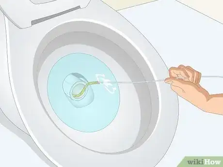 Image titled Unclog a Toilet from a Flushed Toilet Paper Roll Step 10