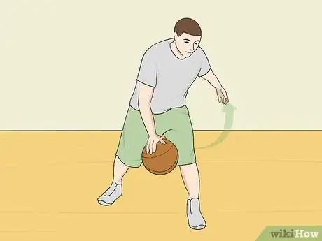 Image titled Dribble a Basketball Between the Legs Step 14.jpeg
