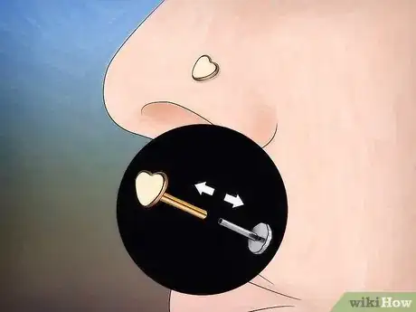 Image titled Remove a Nose Ring Step 3