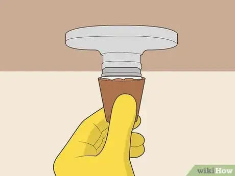 Image titled Remove a Broken Light Bulb Step 7