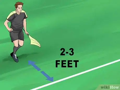 Image titled Signal and Position Yourself As an Assistant Referee in Soccer Step 5
