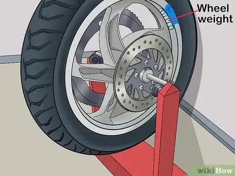 Image titled Balance a Motorcycle Tire Step 9