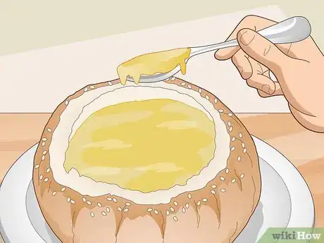 Image titled Eat Soup Served in a Bread Bowl Step 6