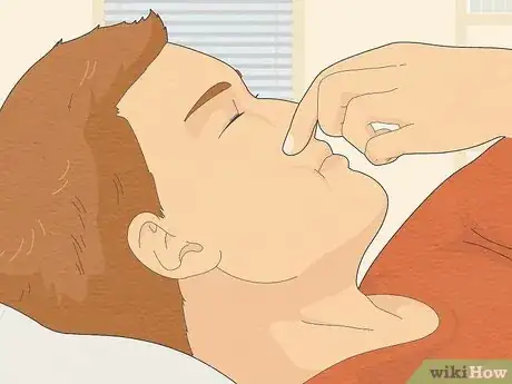 Image titled Remove Water from Ears Step 6