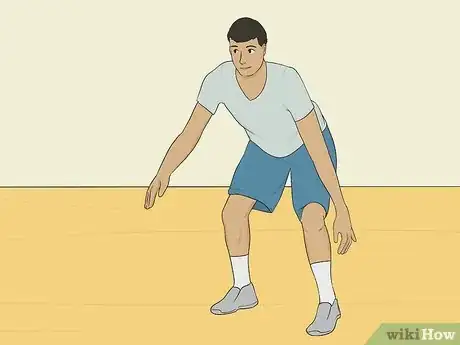 Image titled Dribble a Basketball Between the Legs Step 1.jpeg