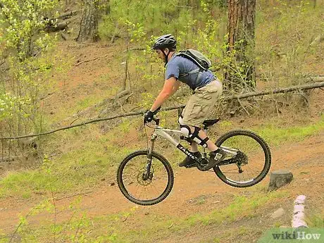 Image titled Ride Off a Drop on a Mountain Bike Step 7