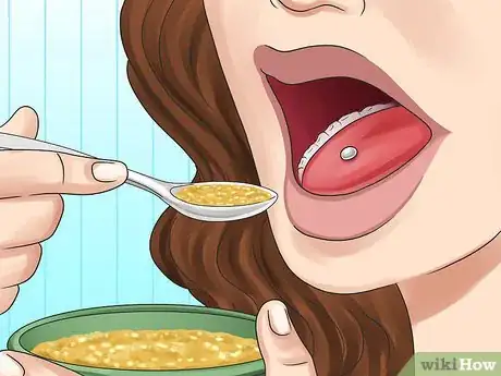 Image titled Eat with a Tongue Piercing Step 1