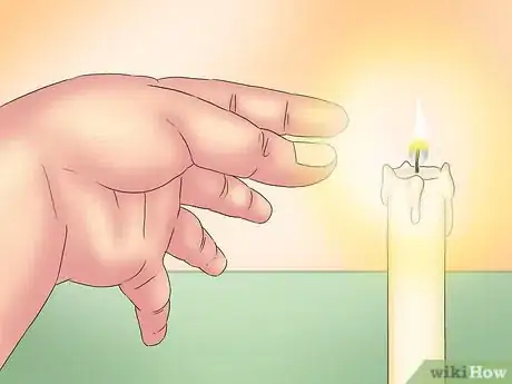 Image titled Put Out a Candle with Your Fingers Step 3