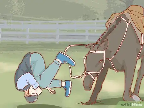 Image titled Avoid Injuries While Falling Off a Horse Step 5