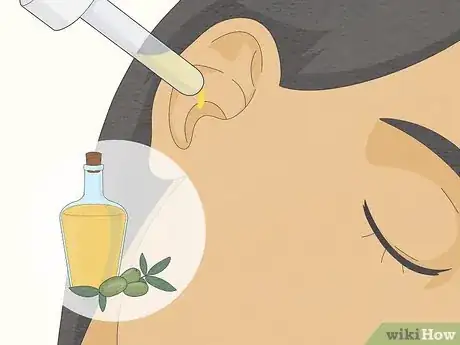 Image titled Massage Ear Wax Out Step 2