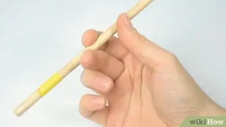 Image titled Spin a Pencil Around Your Middle Finger Step 5