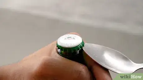 Image titled Open a Bottle Without a Bottle Opener Step 1