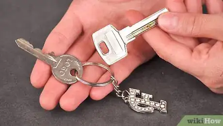 Image titled Add a Key to a Key Ring Step 2