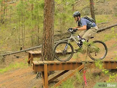 Image titled Ride Off a Drop on a Mountain Bike Step 4
