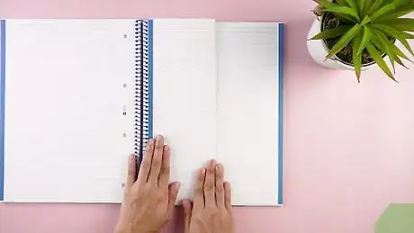 Image titled Put Dividers in a Spiral Notebook Step 1